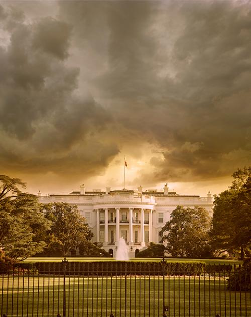 Image of the White House with dark and stormy clouds above it